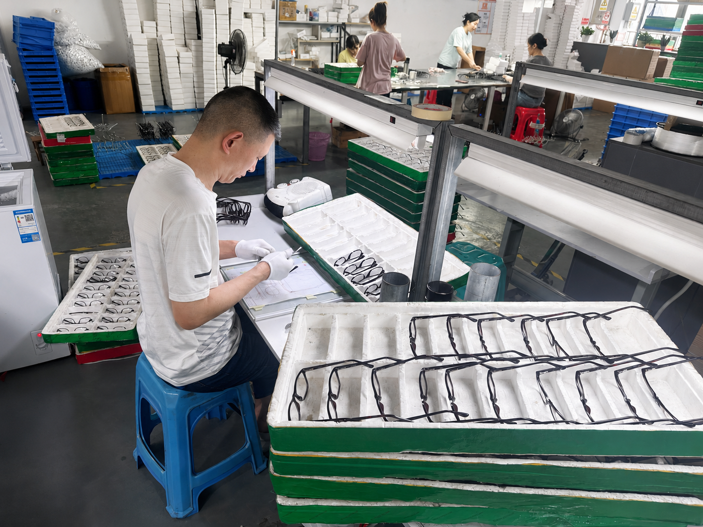 Inspection line checking eyeglass frames